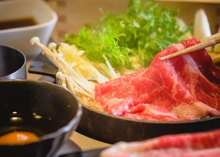 A selection of meats, vegetables and raw waiting to be dunked into a boiling broth at Shabu Shabu "Let Us" Shibuya Center Gai.